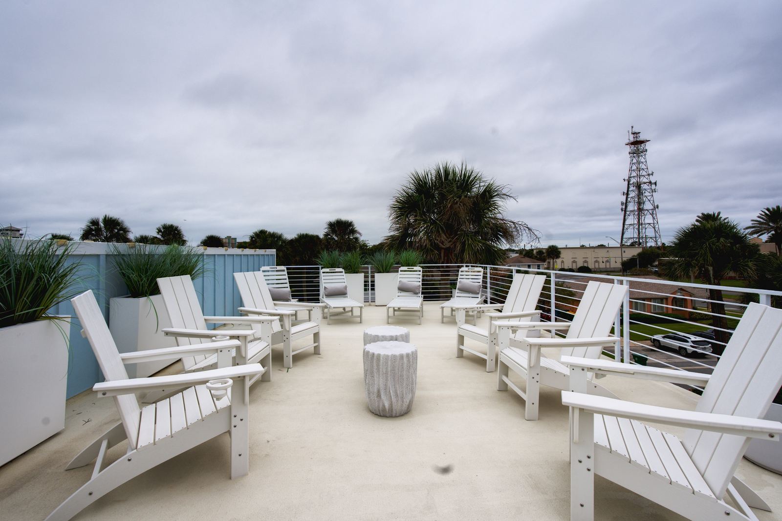Rooftop lounge chairs on a coastal rental