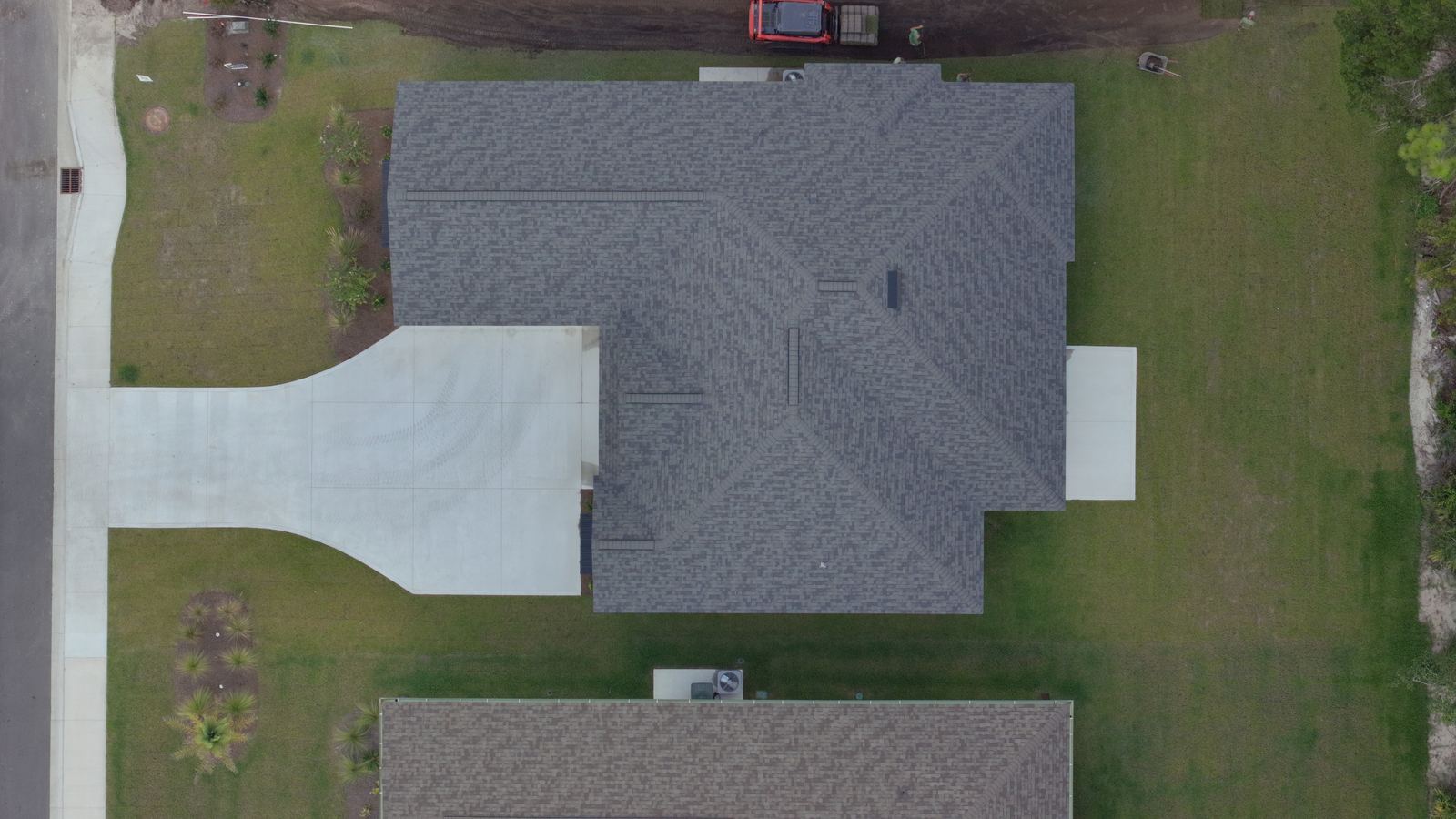 Top down aerial of a house and driveway